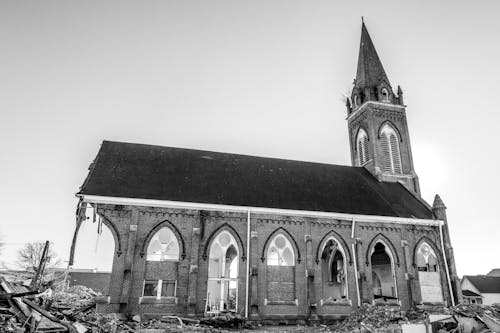 Grayscale Photo of a Demolished Church