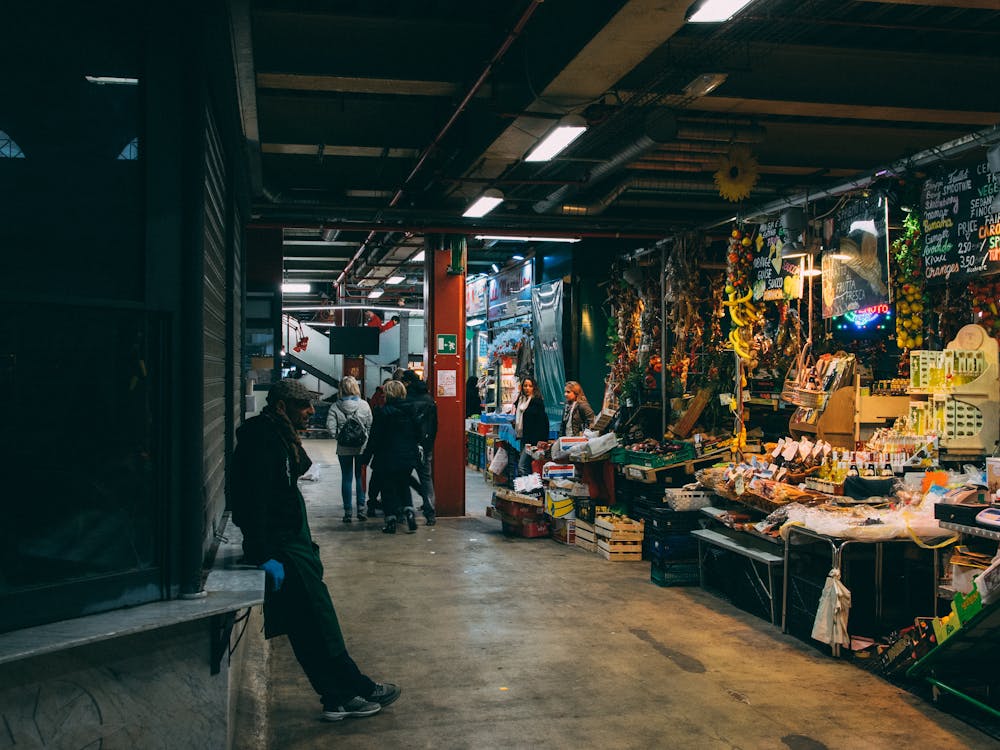 Man Standing in Front of Store