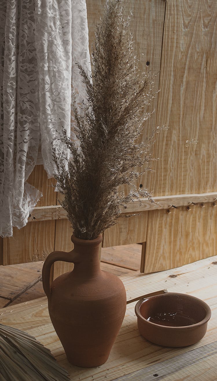 Brown Ceramic Vase On White Table