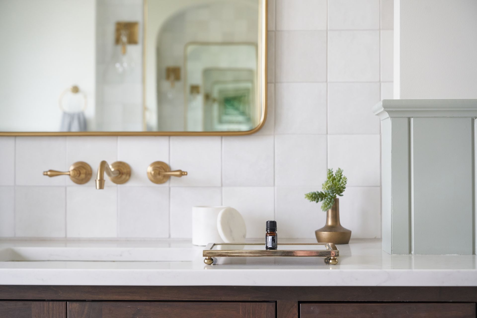 Brown Bottle on Bathroom Sink