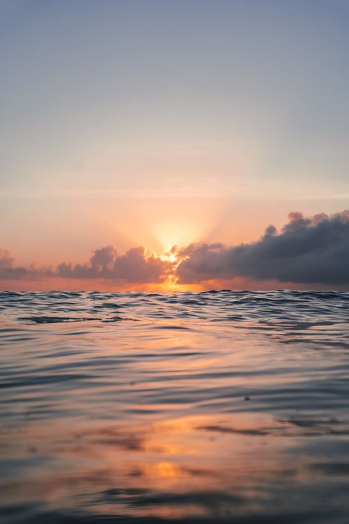 Free Captivating sunset over the ocean in Balneário Camboriú, Brazil. Perfect for relaxation and travel themes. Stock Photo
