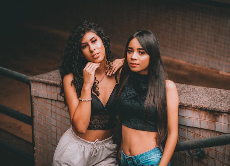 Women In Crop Tops Posing On Stairs