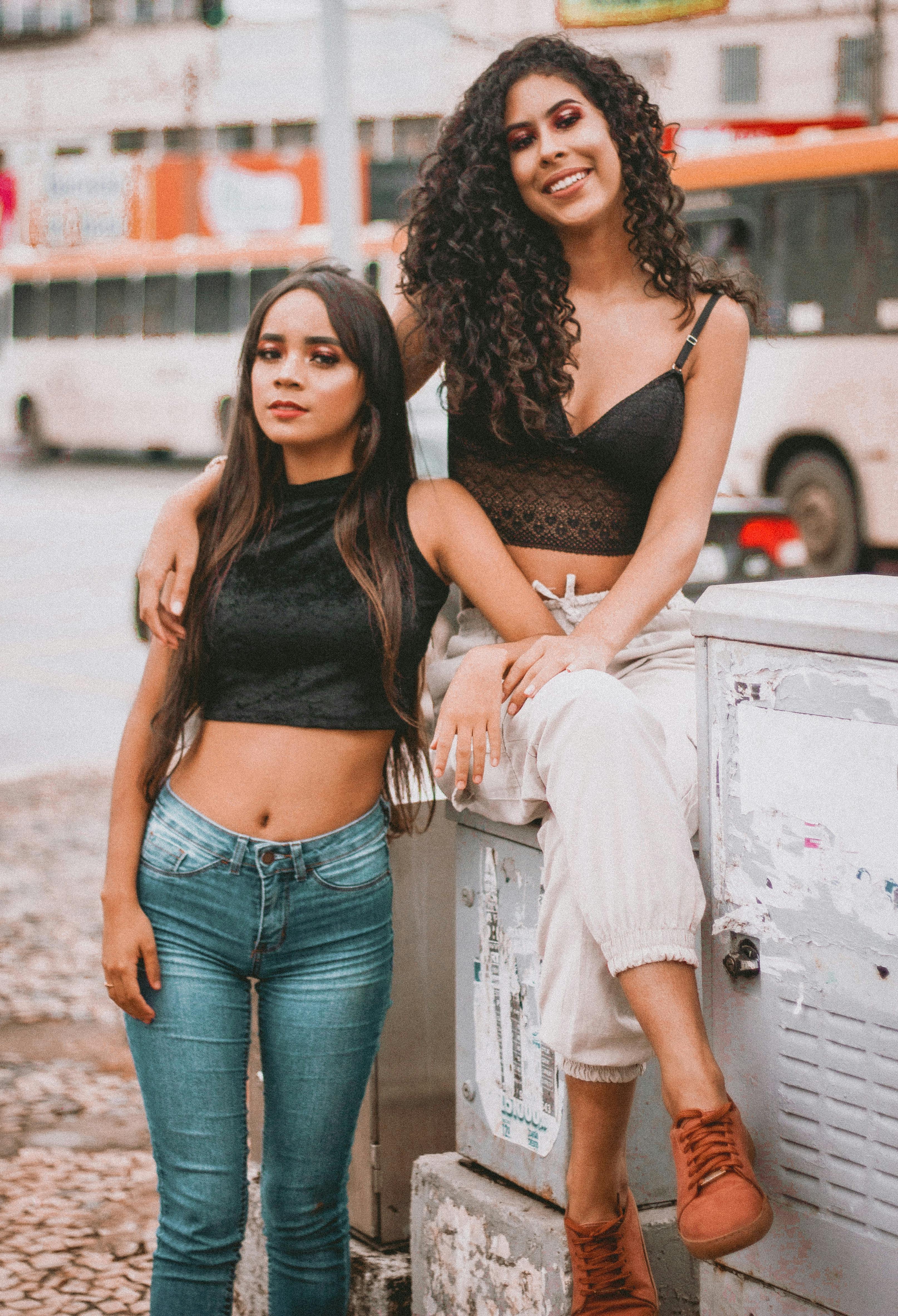 Woman in Black Crop Top and Denim Pants · Free Stock Photo