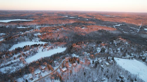 An Aerial Shot of a Snow Covered Town