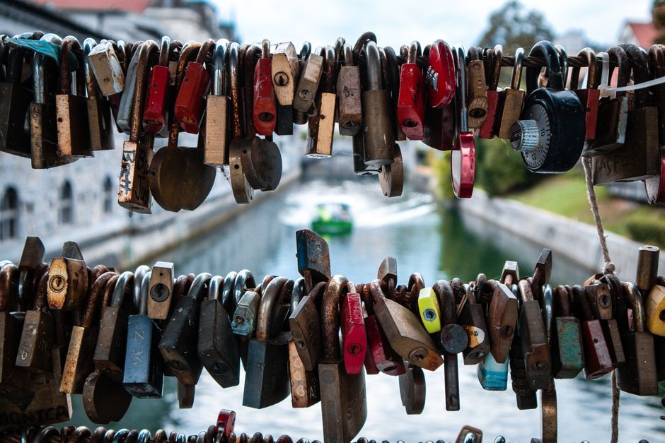 Photo by Pham Ngoc Anh on Pexels Numerous padlocks hang on Butchers' Bridge in Ljubljana, symbolizing love over the Ljubljanica River.