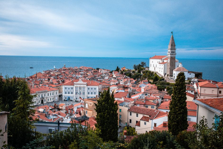 Picturesque Piran coastal town with red roofs overlooking the Adriatic Sea in Slovenia