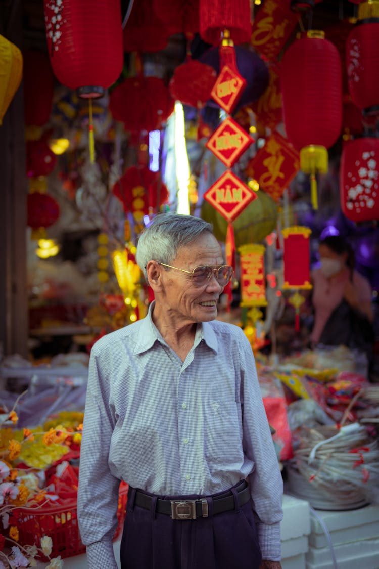 Elderly Man On Traditional Asian Market