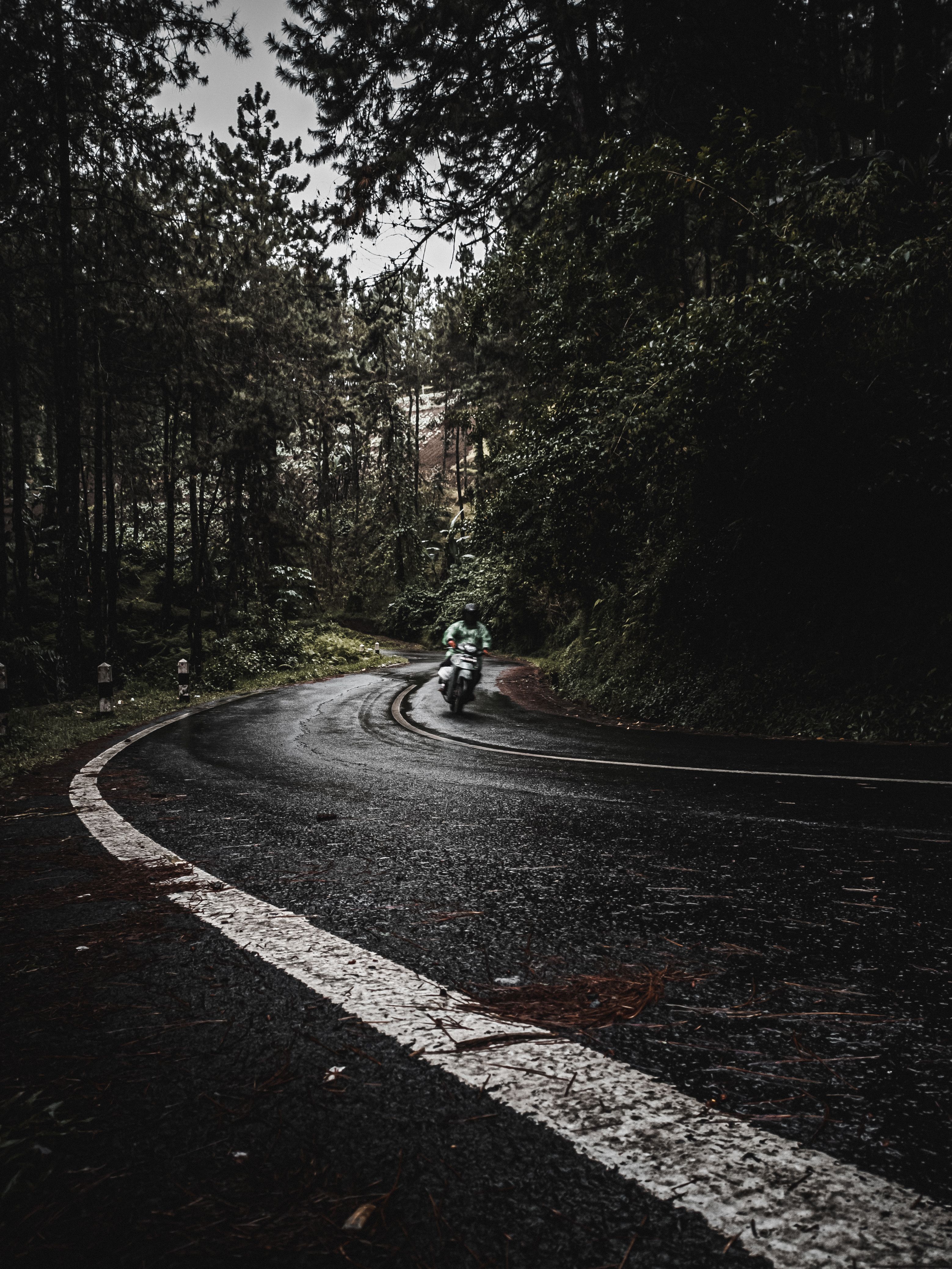 Person Riding Red Sports Bike · Free Stock Photo