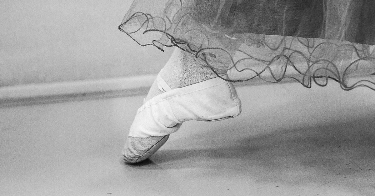 Grayscale Photo of a Foot with Pointe Shoes · Free Stock Photo
