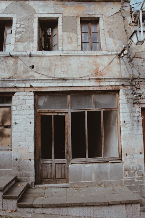 Facade of an Old Abandoned Residential Building 