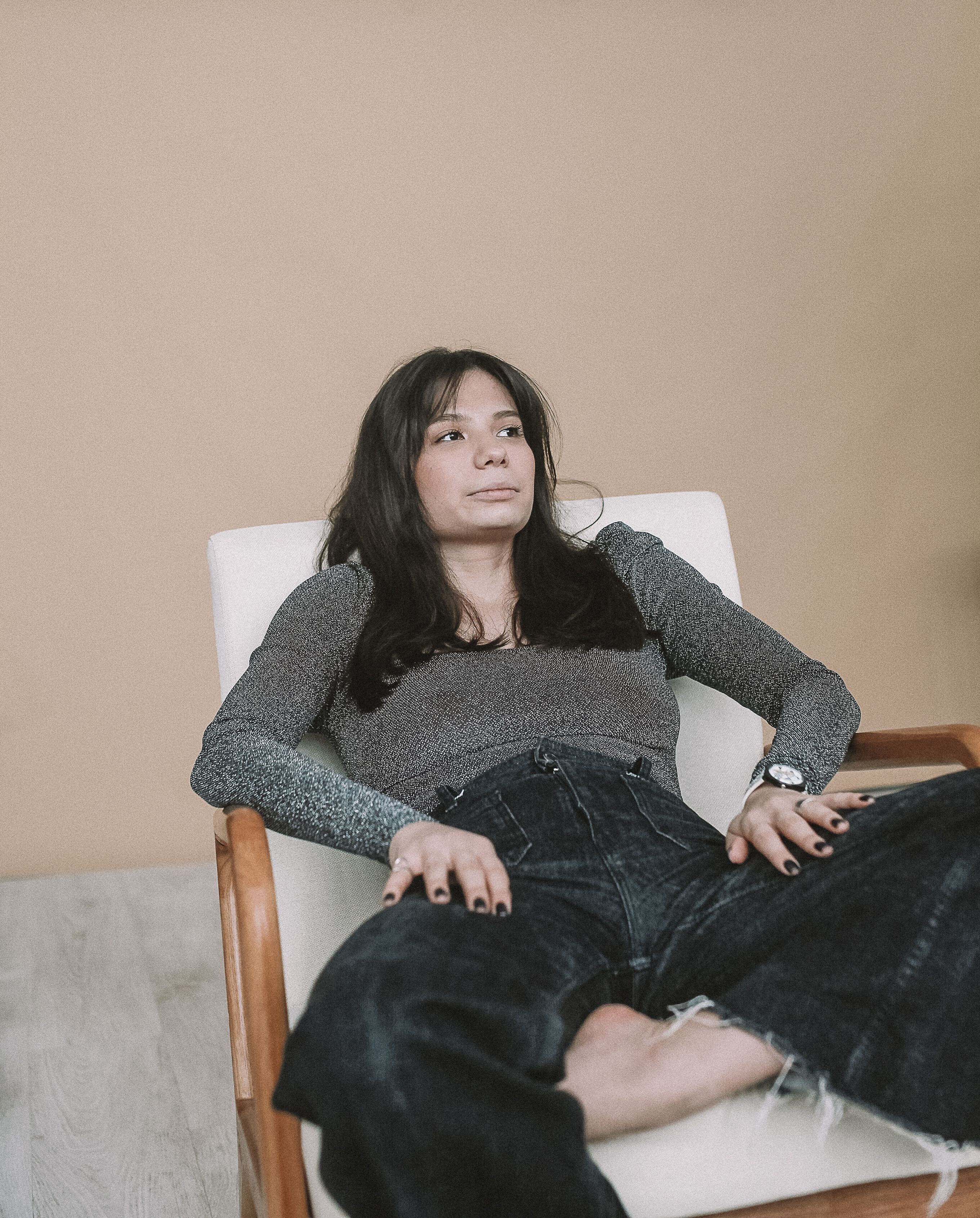 A Beautiful Woman in White Long Sleeves Sitting on the Chair · Free ...