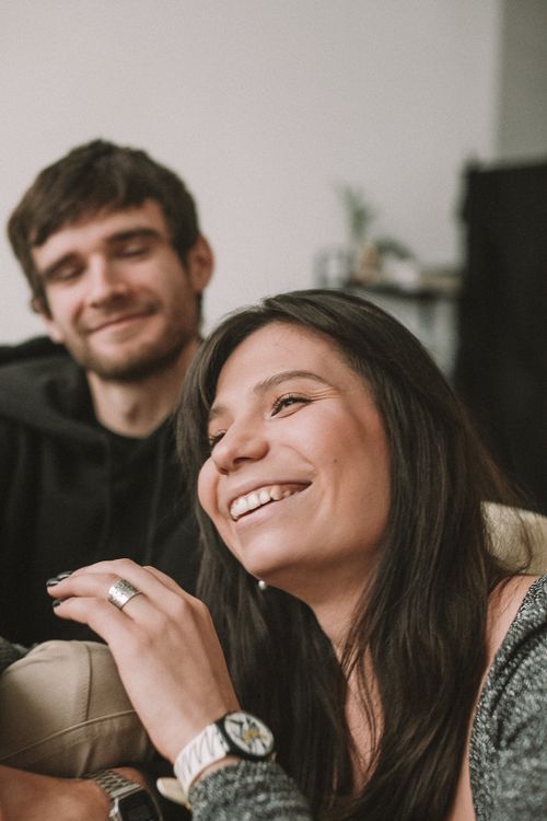 Free A happy couple sharing a joyful moment together indoors, expressing contentment and affection. Stock Photo