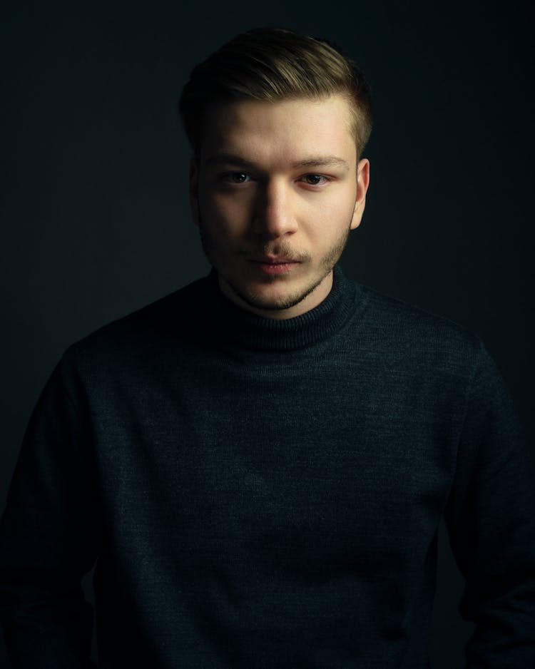 Portrait Of A Fine Looking Man In Dark Blue Turtleneck Shirt