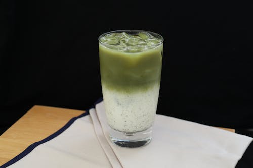 Matcha Latte in Glass on Table