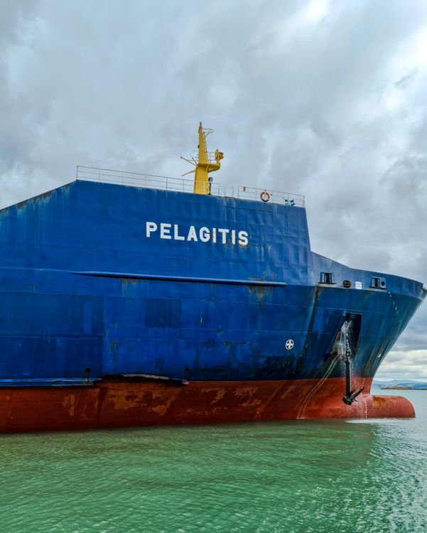 A Blue Ship on Turquoise Water · Free Stock Photo