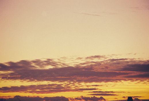 A breathtaking view of a serene sunset skyscape over Serbia with vibrant hues.