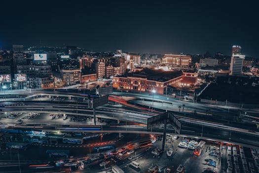 Stunning nighttime aerial shot of downtown Cairo showcasing vibrant city life and architecture.