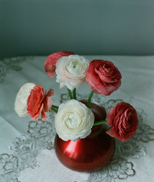 A Red and White Roses on a Ceramic Vase