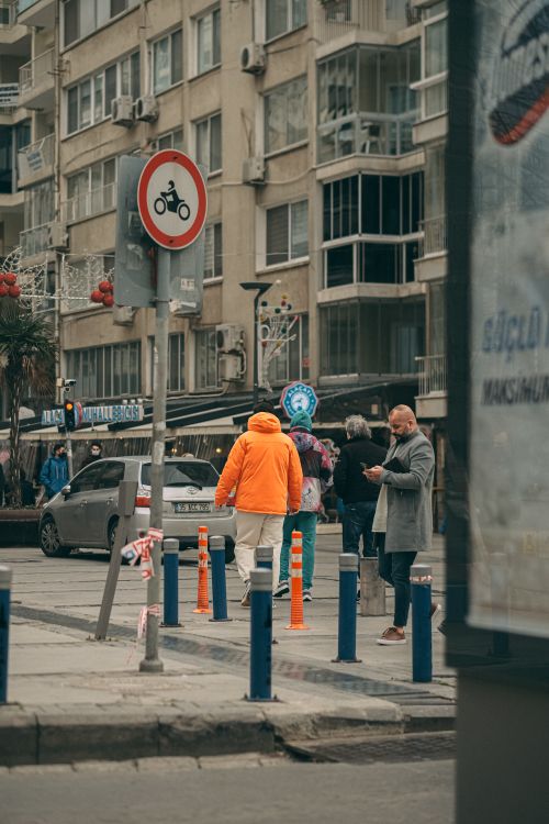 Free Street scene in a bustling urban area with pedestrians and buildings. Stock Photo