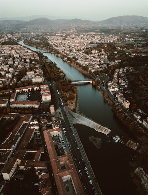 An Aerial Shot of a City with a River