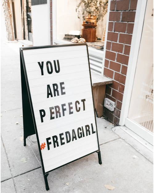 Free A You Are Perfect #Fredagirl Sign on a White Letter Board Stock Photo