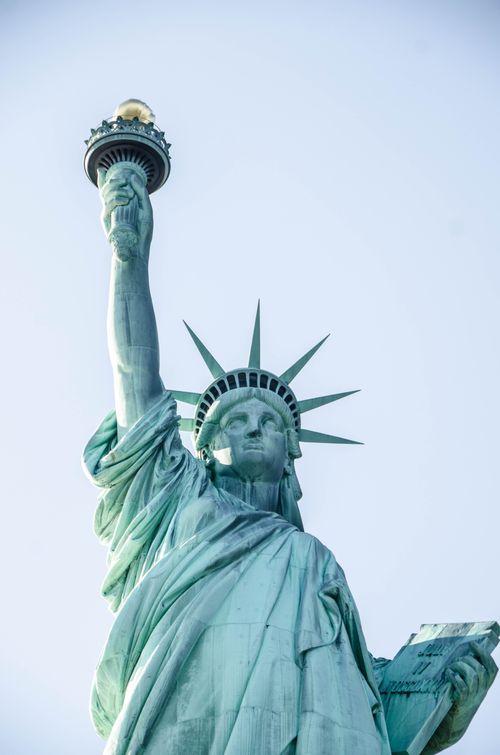 Free Detailed view of the iconic Statue of Liberty against a clear sky. Stock Photo