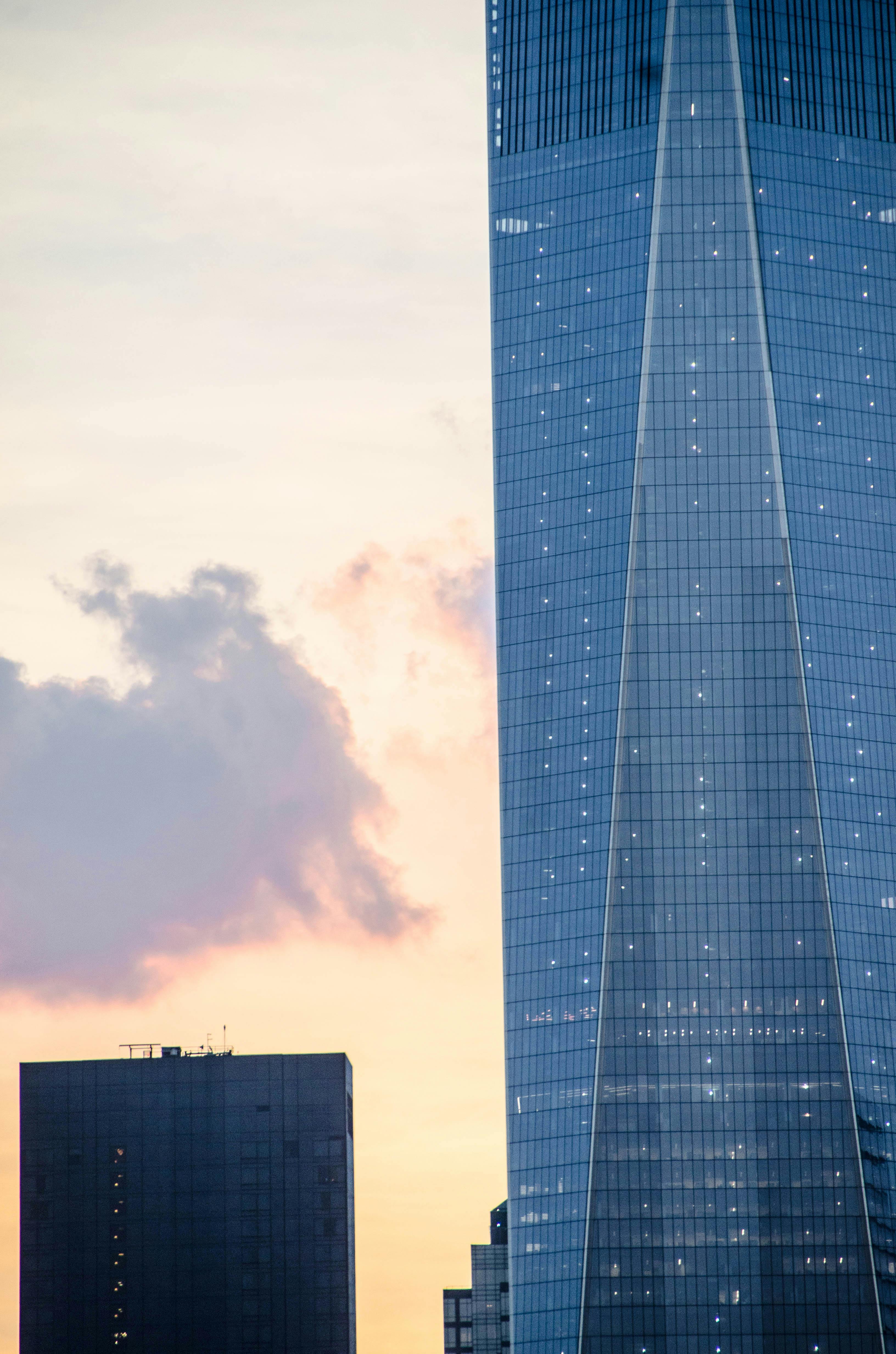 Blue Glass Walled High Rise Building · Free Stock Photo