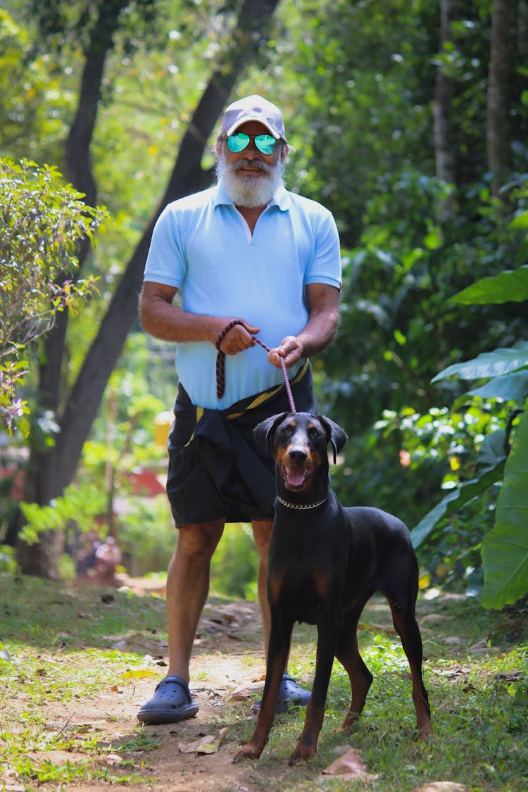 An Elderly Man With His Pet Dog