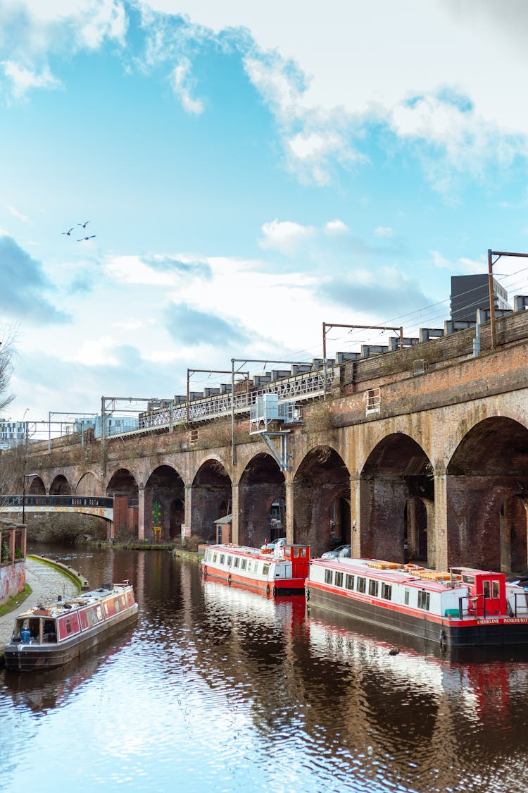 Cruise Ships Moored By The Railway Bridge 