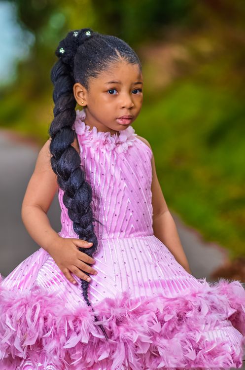 Portrait of a Cute Girl Wearing Pink Dress · Free Stock Photo