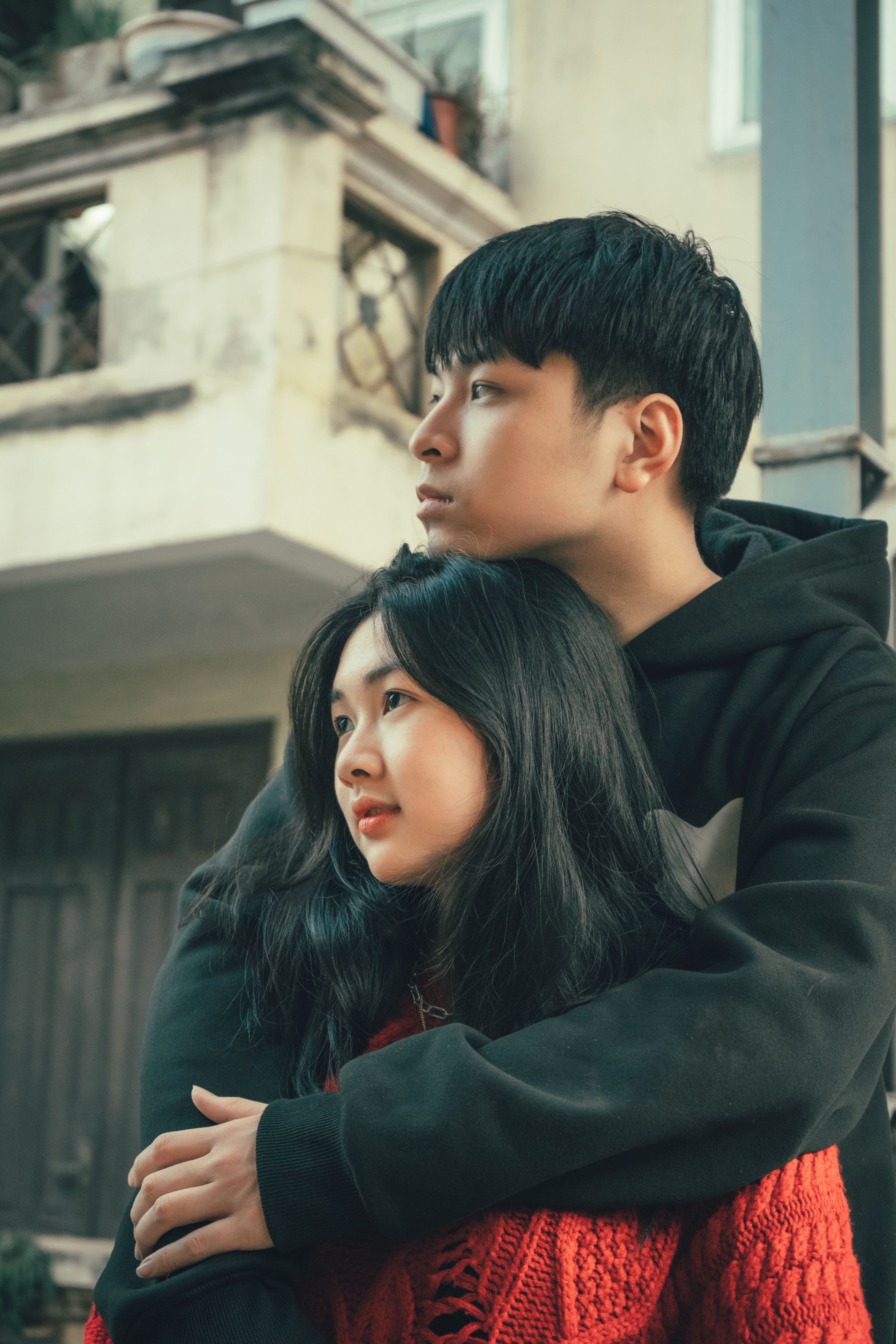 A Man Hugging a Woman from Behind · Free Stock Photo