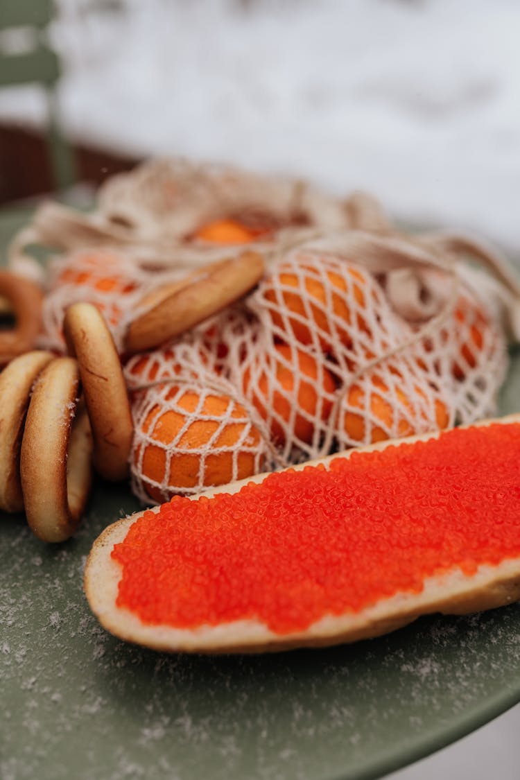 Red Caviar Sandwich With Tangerines In Bag