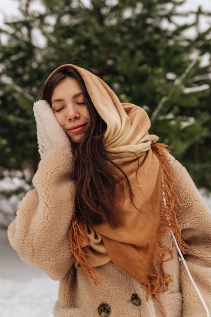 Premium Photo  Portrait of woman in winter clothes on the nature
