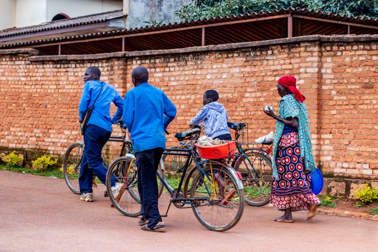 Family With Bikes On Street