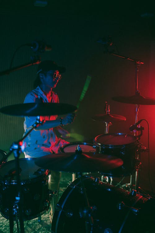 A Man Playing Drums