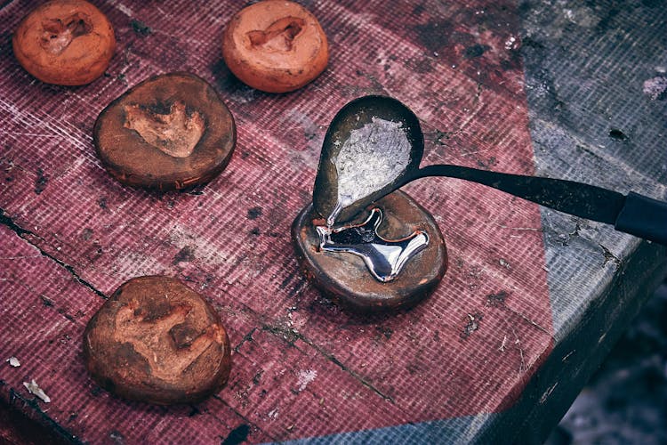 Pouring Liquid On Wooden Trays