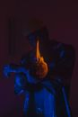 Man in Black Jacket Holding Fire