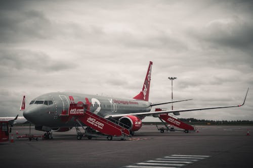 Grey And Red Airplane