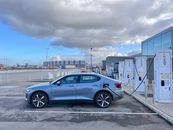 Blue Sedan Parked on Gray Concrete Road