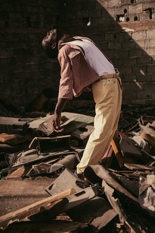 Male Model Posing In Scrapyard 