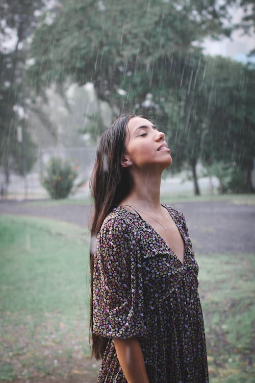 Woman Standing in the Rain