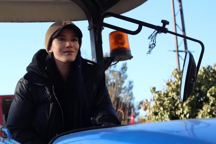 Woman Driving A Tractor 