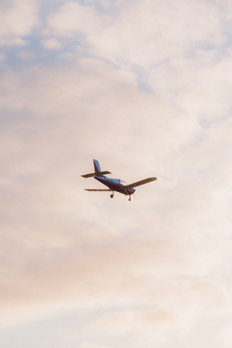 A Flying Airplane In The Sky