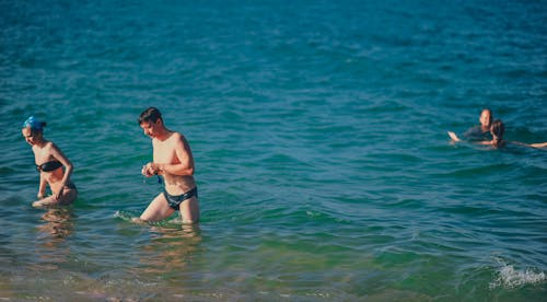 bezplatná Základová fotografie zdarma na téma jezero, lidé, moře Základová fotografie