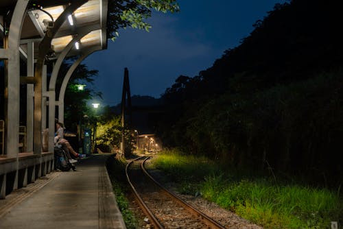 Free stock photo of night lights, railroad track, station