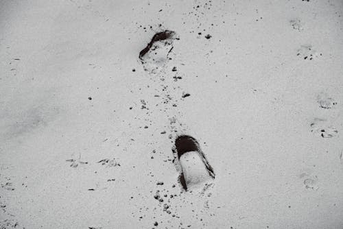 Free Footprints on Gray Sand Stock Photo