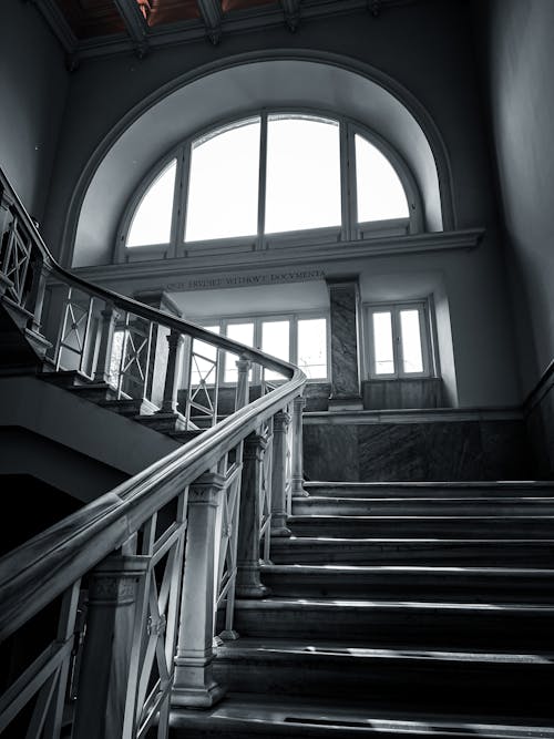 Free Grayscale Photo of a Staircase in a Building Stock Photo
