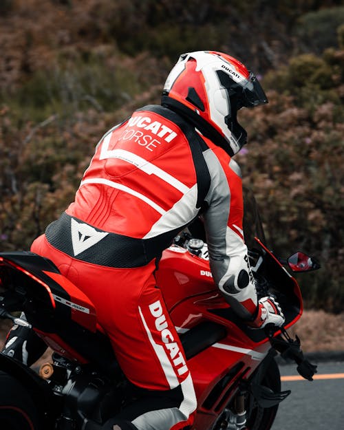 Person Ride a Ducati Motorcycle