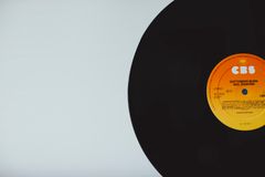 Vinyl record on a pale surface — photo by Markus Spiske on Pexels
