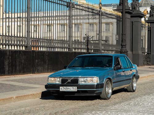 Blue Car Parked on the Side of the Street